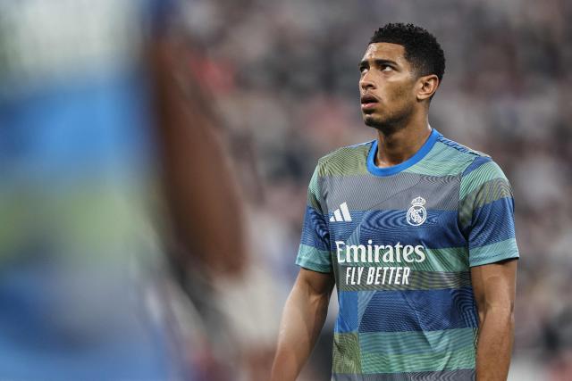 Real Madrid's English midfielder #05 Jude Bellingham warms up prior to the start of the Spanish Super Cup final football match between FC Barcelona and Real Madrid at the King Abdullah Stadium in Jeddah on January 11, 2026. (Photo by Fadel SENNA / AFP)