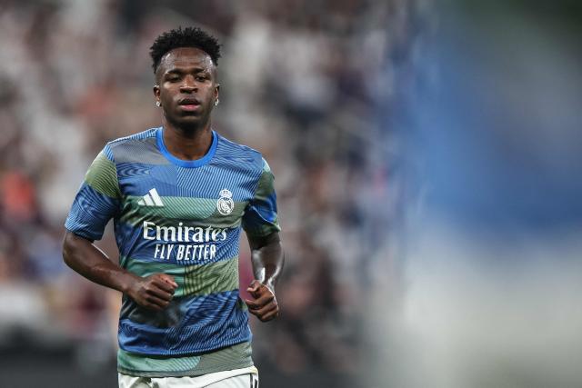 Real Madrid's Brazilian forward #07 Vinicius Junior warms up prior to the start of the Spanish Super Cup final football match between FC Barcelona and Real Madrid at the King Abdullah Stadium in Jeddah on January 11, 2026. (Photo by Fadel SENNA / AFP)