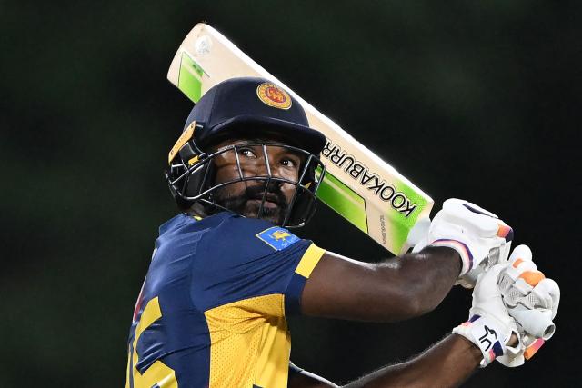 Sri Lanka's Janith Liyanage plays a shot during the third and final Twenty20 international cricket match between Pakistan and Sri Lanka at the Rangiri Dambulla International Stadium in Dambulla on January 11, 2026. (Photo by Ishara S. KODIKARA / AFP)