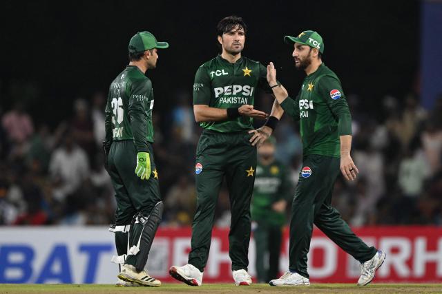 Pakistan's Mohammad Wasim (C) celebrates with teammates after taking the wicket of Sri Lanka's Kusal Mendis during the third and final Twenty20 international cricket match between Pakistan and Sri Lanka at the Rangiri Dambulla International Stadium in Dambulla on January 11, 2026. (Photo by Ishara S. KODIKARA / AFP)