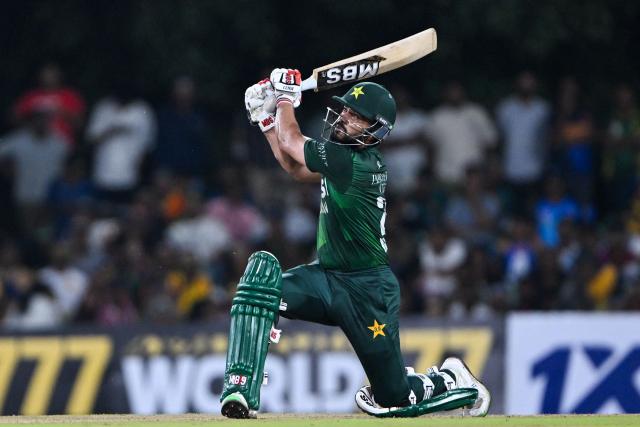 Pakistan's Mohammad Nawaz plays a shot during the third and final Twenty20 international cricket match between Pakistan and Sri Lanka at the Rangiri Dambulla International Stadium in Dambulla on January 11, 2026. (Photo by Ishara S. KODIKARA / AFP)