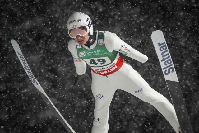 Slovenia's Anze Lanisek soars through the air during the Men's Large Hill HS140 event of the FIS Ski Jumping World Cup in Zakopane, Poland on January 11, 2026. (Photo by Wojtek RADWANSKI / AFP)