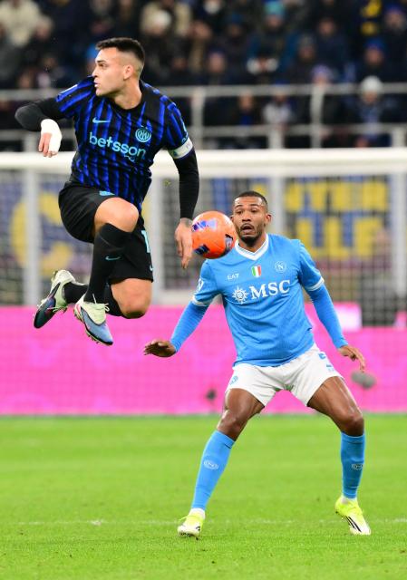 Inter Milan's Argentinian forward #10 Lautaro Martinez controls the ball in front of Napoli's Brazilian defender #05 Juan Jesus during the Italian Serie A football match between Inter Milan and Napoli at San Siro stadium in Milan, on January 11, 2026. (Photo by Stefano RELLANDINI / AFP)