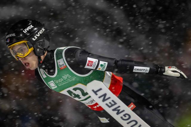 France's Valentin Foubert soars through the air during the Men's Large Hill HS140 event of the FIS Ski Jumping World Cup in Zakopane, Poland on January 11, 2026. (Photo by Wojtek RADWANSKI / AFP)