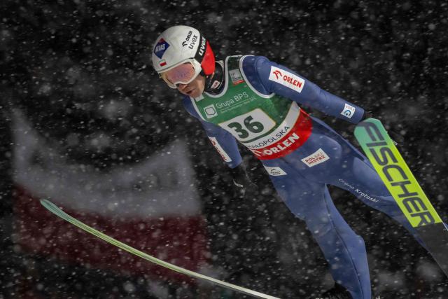 Poland's Kamil Stoch soars through the air during the Men's Large Hill HS140 event of the FIS Ski Jumping World Cup in Zakopane, Poland on January 11, 2026. (Photo by Wojtek RADWANSKI / AFP)