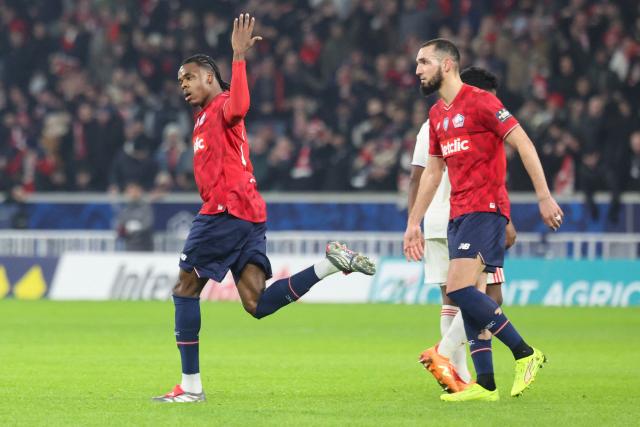 Lille's Belgian defender #03 Nathan Ngoy celebrates scoring his team's first goal during the French Cup round of 32 football match between Lille OSC and Olympique Lyonnais at the Stade Pierre-Mauroy in Villeneuve-d'Ascq, northern France on January 11, 2026. (Photo by Francois LO PRESTI / AFP)