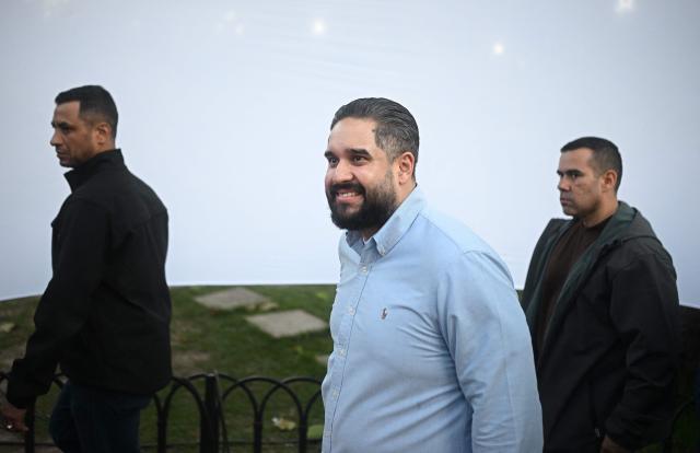 Deputy Nicolas Maduro Guerra, son of ousted President Nicolas Maduro, leaves a rally of Evangelical in support of his father and Cilia Flores at Plaza Bolivar in Caracas on January 11, 2026.  (Photo by Federico PARRA / AFP)