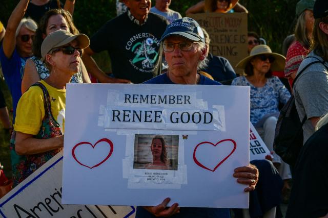 Demonstrators protest against Immigration and Customs Enforcement (ICE) and demanding the closure of the immigrant detention center known as "Alligator Alcatraz" outside the center at the Dade-Collier Training and Transition Airport in Ochopee, Florida, on January 11, 2026. A US Immigration and Customs Enforcement (ICE) agent shot and killed 37-year-old Renee Nicole Good on the streets of Minneapolis on January 7, leading to huge protests and outrage from local leaders who rejected White House claims she was a domestic terrorist. (Photo by Giorgio VIERA / AFP)