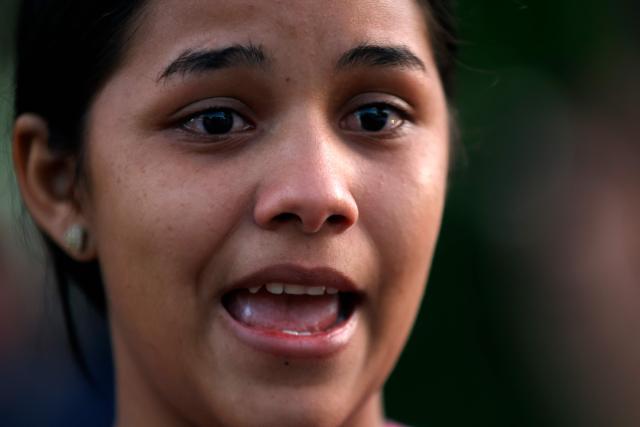 Lorealbert Gutierrez, 19, speaks while waiting for news on the release of prisoners, outside El Rodeo I prison in Guatire, Miranda State, some 30 kilometers east of Caracas on January 10, 2026. Venezuelans were waiting for more political prisoners to be released, as ousted president Nicolas Maduro defiantly claimed from his US jail cell that he is "doing fine" after being seized by US forces a week ago. (Photo by Pedro MATTEY / AFP)