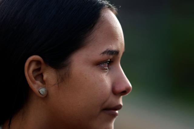 Lorealbert Gutierrez, 19,  gestures while waiting for news on the release of prisoners, outside El Rodeo I prison in Guatire, Miranda State, some 30 kilometers east of Caracas on January 10, 2026. Venezuelans were waiting for more political prisoners to be released, as ousted president Nicolas Maduro defiantly claimed from his US jail cell that he is "doing fine" after being seized by US forces a week ago. (Photo by Pedro MATTEY / AFP)