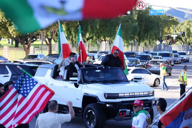 People take part in a “Free Iran” rally in Los Angeles, California, on January 11, 2026. The Norway-based NGO Iran Human Rights (IHR) said it had confirmed the killing of at least 192 protesters but warned the actual death toll could already amount to several hundreds, or even more. The IHR has an extensive network of sources in the country. The protests, initially sparked by anger over the rising cost of living, have evolved into a movement against the theocratic system in place in Iran since the 1979 revolution. They have already lasted two weeks. (Photo by Jonathan Alcorn / AFP)