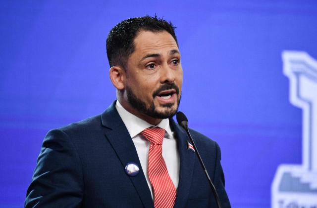 Costa Rica's Presidential candidate Ronny Castillo, of the Aqui Costa Rica Manda Party,speaks during the debate at the Supreme Electoral Tribunal (TSE) in San Jose, Costa Rica on January 11, 2026. Costa Rica will hold presidential election on February 1. (Photo by Ezequiel BECERRA / AFP)