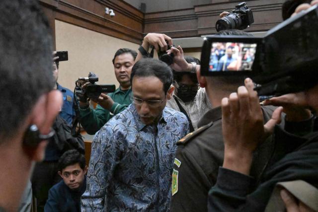 Indonesia's former education minister Nadiem Makarim attends his trial at the Corruption Court in Jakarta on January 12, 2026. Makarim, who is also a co-founder of ride-hailing app Gojek, is on trial for his involvement in a 124 million USD corruption scandal linked to a government procurement project for school laptops during his tenure as education minister. (Photo by BAY ISMOYO / AFP)