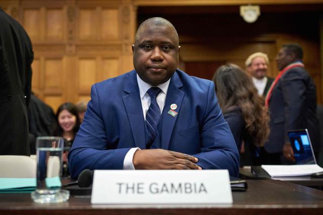 Dawda Jallow, Minister of Justice of the Republic of Gambia waits for the start of the first hearing at the International Court of Justice in which Myanmar is accused of committing genocide against the country's Muslim minority, the Rohingya, in the Hague on January 12, 2026. The Gambia filed the genocide case in cooperation with the Organization of Islamic Cooperation in 2019. Myanmar's military deliberately targeted the Rohingya minority in a bid to destroy the community, Gambia's Justice Minister Dawda Jallow told the International Court of Justice Monday at the start of a genocide hearing. (Photo by Phil Nijhuis / ANP / AFP) / Netherlands OUT
