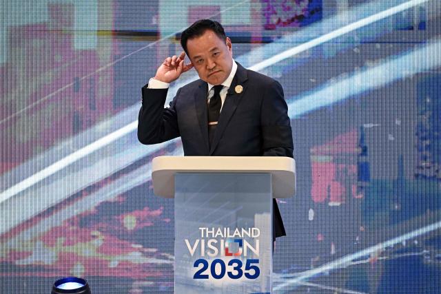 Prime minister and Bhumjaithai Party’s party leader Anutin Charnvirakul speaks about the party’s future vision for the country at the Global Dynamics and Thailand’s Future event at Queen Sirikit National Convention Center in Bangkok on January 12, 2026. (Photo by Lillian SUWANRUMPHA / AFP)