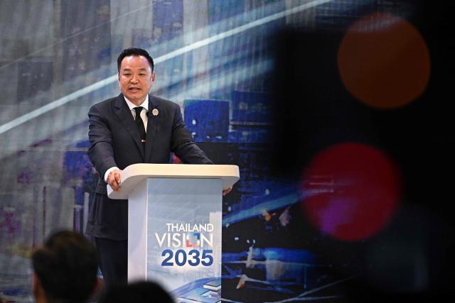 Prime minister and Bhumjaithai Party’s party leader Anutin Charnvirakul speaks about the party’s future vision for the country at the Global Dynamics and Thailand’s Future event at Queen Sirikit National Convention Center in Bangkok on January 12, 2026. (Photo by Lillian SUWANRUMPHA / AFP)