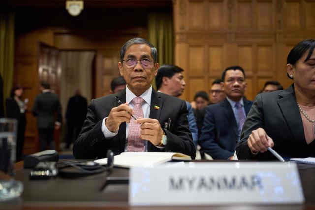 Myanmar's Minister of International Cooperation Ko Ko Hlaing waits for the start of the first hearing at the International Court of Justice in which Myanmar is accused of committing genocide against the country's Muslim minority, the Rohingya, in the Hague on January 12, 2026. The Gambia filed the genocide case in cooperation with the Organization of Islamic Cooperation in 2019. Myanmar's military deliberately targeted the Rohingya minority in a bid to destroy the community, Gambia's Justice Minister Dawda Jallow told the International Court of Justice Monday at the start of a genocide hearing. (Photo by Phil Nijhuis / ANP / AFP) / Netherlands OUT