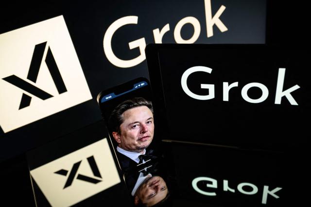 (FILES) This photograph taken on January 13, 2025 in Toulouse shows screens displaying the logo of Grok, a generative artificial intelligence chatbot developed by xAI, the American company specializing in artificial intelligence and it's founder South African businessman Elon Musk. The UK's internet security regulator Ofcom announced on Monday, January 12, 2026, the opening of a "formal investigation" into the social network X "concerning sexually explicit images disseminated" by its artificial intelligence assistant Grok, according to a statement. (Photo by Lionel BONAVENTURE / AFP)