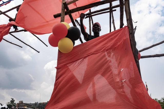 A supporter of opposition leader and presidential candidate for the National Unity Platform (NUP) Robert Kyagulanyi Ssentamu, popularly known as Bobi Wine, gestures during his final presidential campaign rally in Kampala, on January 12, 2026. (Photo by Badru Katumba / AFP)