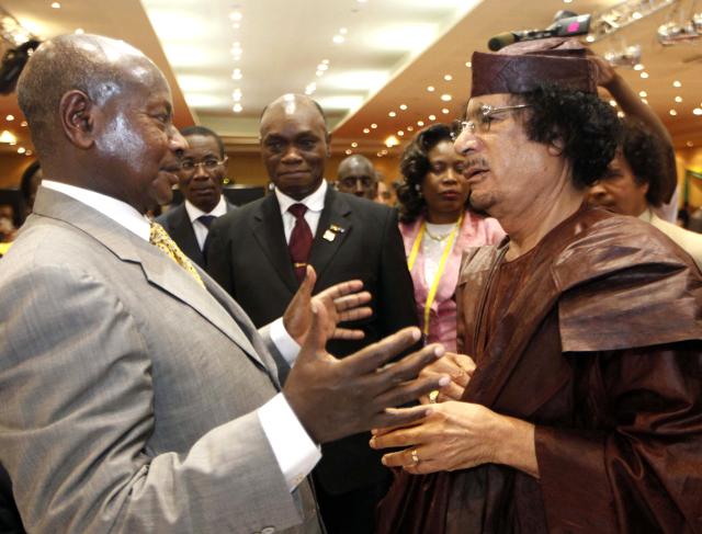 (FILES) Ugandan President Yoweri Museveni (L) speaks with Libyan leader Moamer Kadhafi on the last day of the 15th African Union Summit in Kampala, on July 27, 2010, as 30 heads of state from the AU's 53 members gathered for three days amid unprecedented security in the Ugandan capital. Yoweri Museveni has been president longer than most Ugandans have been alive, and shows no sign of giving up his place among the world's longest-serving leaders.
Museveni says he is fighting fit and ready for a seventh term if he wins January 15, 2026's election. (Photo by Mahmud TURKIA / AFP)