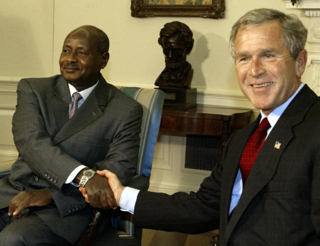 (FILES) US President George W. Bush (R) and the Ugandan President Yoweri Museveni shake hands on June 10, 2003 in the Oval Office of the White House in Washinton, DC. Yoweri Museveni has been president longer than most Ugandans have been alive, and shows no sign of giving up his place among the world's longest-serving leaders.
Museveni says he is fighting fit and ready for a seventh term if he wins January 15, 2026's election. (Photo by Paul J. RICHARDS / AFP)