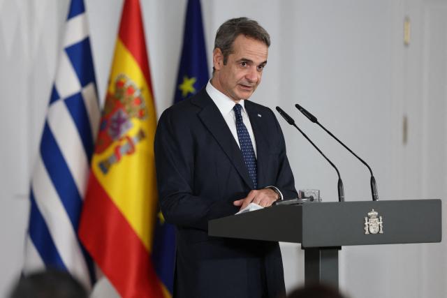 Greece's Prime Minister Kyriakos Mitsotakis speaks during a joint news conference with Spain's Prime Minister Pedro Sanchez at the Moncloa Palace in Madrid on January 12, 2026. (Photo by Pierre-Philippe MARCOU / AFP)