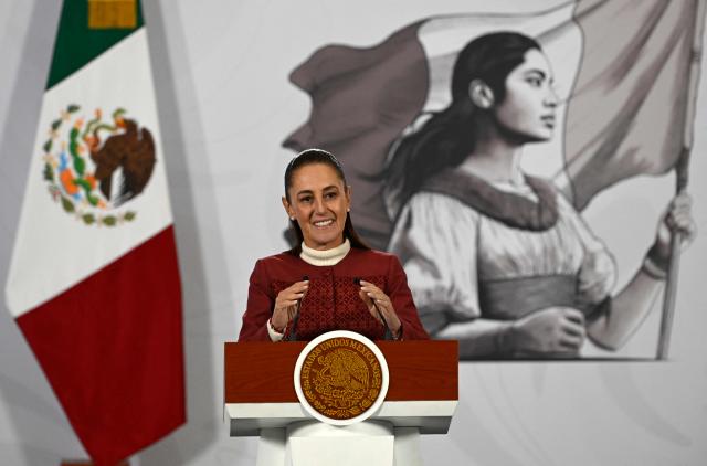 Mexico's President Claudia Sheinbaum speaks during her daily press conference at Palacio Nacional in Mexico City on January 12, 2026. Sheinbaum said  that she had discussed her country's security and sovereignty with Donald Trump after the US president threatened ground attacks against drug cartels, following the overthrow of Venezuelan President Nicolas Maduro amid bombings on January 3. (Photo by Alfredo ESTRELLA / AFP)
