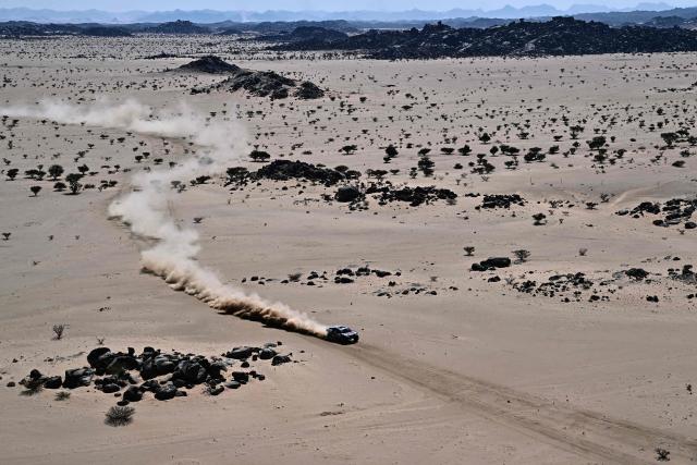 Ford Racing’s Spanish driver Nani Roma and Spanish co-pilot Alex Haro compete in Stage 8 of the 48th edition of the Dakar Rally 2026, between Wadi ad-Dawasir and Wadi ad-Dawasir in Saudi Arabia on January 12, 2026. (Photo by Giuseppe CACACE / AFP)