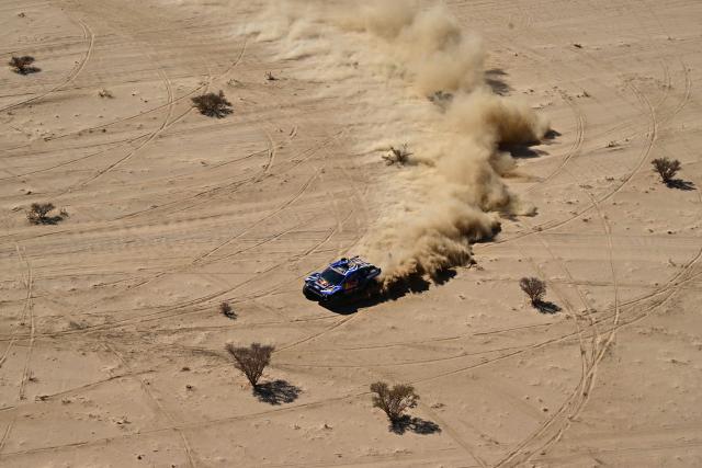 Ford Racing’s Swedish driver Mattias Ekstrцm and Swedish co-pilot Emil Bergkvist compete in Stage 8 of the 48th edition of the Dakar Rally 2026, between Wadi ad-Dawasir and Wadi ad-Dawasir in Saudi Arabia on January 12, 2026. (Photo by Giuseppe CACACE / AFP)