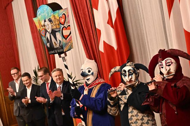 (L-R) Mayor of city of Basel Lukas Engelberger, Mayor of Vienna Michael Ludwig and the General Director of Austrian broadcasting corporation ORF Roland Weissmann attend a Eurovision Song Contest 2026 ceremonial hand over, of a specially designed carnival lantern from Basel to Vienna, in Vienna’s city hall in Vienna, Austria on January 12, 2026, prior the the draw of 2 ESC semifinal groups. (Photo by Joe Klamar / AFP)