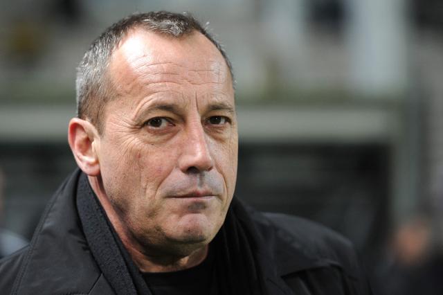 (FILES) A photo taken on March 15, 2013 shows AC Ajaccio's president Alain Orsoni before the French L1 football match Marseille vs Ajaccio at the Velodrome stadium in Marseille, southern France. Alain Orsoni, a former Corsican nationalist leader turned businessman and former head of the AC Ajaccio football club, was shot dead during his mother's funeral on January 12, 2026, in the village of Vero, southern Corsica, according to a source close to the investigation. (Photo by Anne-Christine POUJOULAT / AFP)