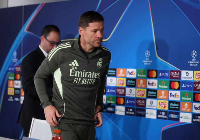(FILES) Real Madrid's Spanish coach Xabi Alonso leaves the press conference at Valdebebas training grounds in Madrid on December 9, 2025 on the eve of their Champions League football match against Manchester City. Real Madrid said on January 12, 2026 that coach Xabi Alonso has left the club by mutual consent, a day after the team lost the Spanish Super Cup final against rivals Barcelona. (Photo by Pierre-Philippe MARCOU / AFP)