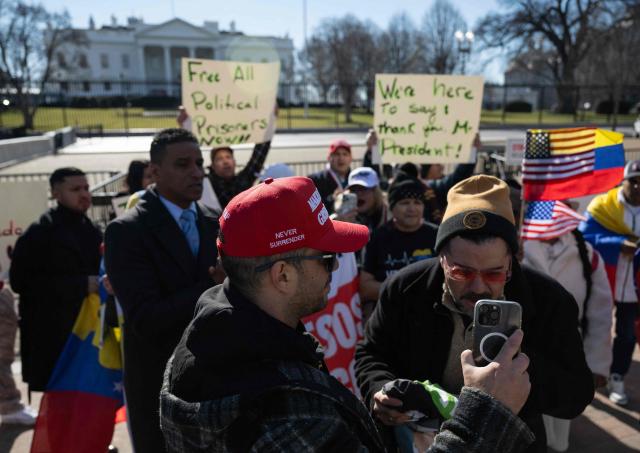 Supporters and activists backing US president Donald Trump gather outside the White House in Washington, DC, on January 12, 2026, celebrating  the ouster of Venezuelan President Nicolas Maduro. (Photo by ANDREW CABALLERO-REYNOLDS / AFP)