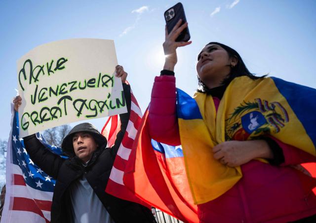 Supporters and activists backing US president Donald Trump gather outside the White House in Washington, DC, on January 12, 2026, celebrating  the ouster of Venezuelan President Nicolas Maduro. (Photo by ANDREW CABALLERO-REYNOLDS / AFP)