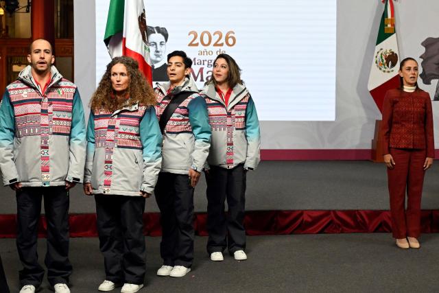 Mexico’s President Claudia Sheinbaum and the Mexican athletes  Allan Corona (L), Sarah Schleper (2nd L), Donovan Carrillo (3nd R) and Regina Martinez (4nd L) sing the national anthem during the flag-raising ceremony for the Mexican delegation of athletes that will participate in the Milano-Cortina 2026 Winter Olympic Games, after her daily press conference at the National Palace in Mexico City on January 12, 2026. (Photo by Alfredo ESTRELLA / AFP)