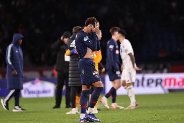 Paris Saint-Germain's French midfielder #14 Desire Doue reacts after Paris FC's French midfielder #14 Jonathan Ikone scored his team´s first goal during the French Cup round of 32 football match between Paris Saint-Germain (PSG) and Paris FC at the Parc des Princes stadium in Paris on January 12, 2026. (Photo by Anne-Christine POUJOULAT / AFP)