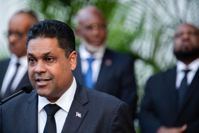 Chairman of the Transitional Presidential Councilof Haiti, Laurent Saint-Cyr, makes a speech during a tribute to the victims of the January 12, 2010 earthquake in Port-au-Prince, Haiti, on January 12, 2026. (Photo by Clarens SIFFROY / AFP)