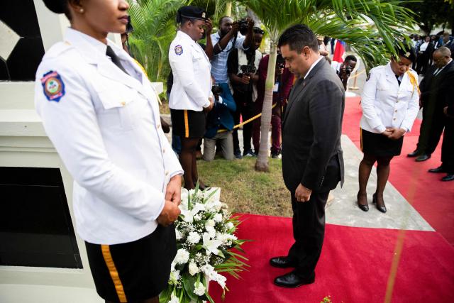 Chairman of the Transitional Presidential Councilof Haiti, Laurent Saint-Cyr, pays respects in tribute to the victims of the January 12, 2010 earthquake in Port-au-Prince, Haiti, on January 12, 2026. (Photo by Clarens SIFFROY / AFP)