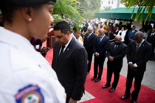 Chairman of the Transitional Presidential Council of Haiti, Laurent Saint-Cyr, pays respects in tribute to the victims of the January 12, 2010 earthquake in Port-au-Prince, Haiti, on January 12, 2026. (Photo by Clarens SIFFROY / AFP)