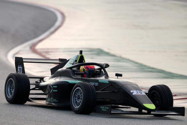 Romania's Zoe Florescu-Potolea drives during a test training session at the Circuit de Barcelona-Catalunya in Montmelo, Barcelona province,on December 16, 2025. The project of More Than Equal, founded by entrepreneur and philanthropist Karel Komarek and former F1 driver David Coulthard, is simple and fearlessly ambitious: to find and develop the first woman F1 world champion in a male-dominated sport. (Photo by Lluis GENE / AFP)