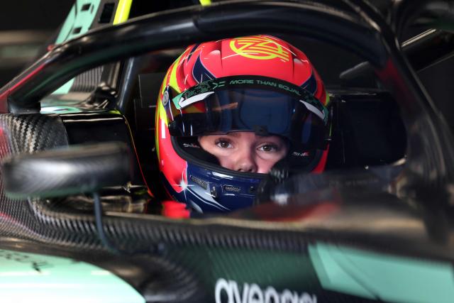 Romania's Zoe Florescu-Potolea sits in her car during a test training session at the Circuit de Barcelona-Catalunya in Montmelo, Barcelona province, on December 15, 2025. The project of More Than Equal, founded by entrepreneur and philanthropist Karel Komarek and former F1 driver David Coulthard, is simple and fearlessly ambitious: to find and develop the first woman F1 world champion in a male-dominated sport. (Photo by Lluis GENE / AFP)