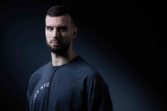(FILES) French handball player Nedim Remili poses during a photo session in Paris, on December 18, 2023. Nedim Remili, centre back for the French handball team, is forfeit for the Men's EHF Euro 2026 European Handball Championship (January 15 - February 1) due to an injury to his left calf, the French Handball Federation announced on January 13, 2026. (Photo by JULIEN DE ROSA / AFP)