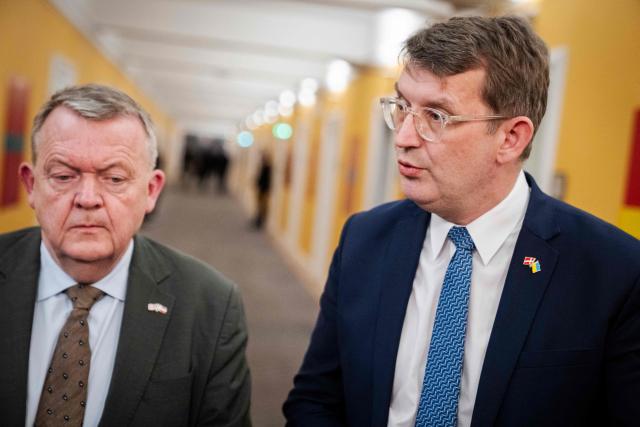 Danish Defense Minister Troels Lund Poulsen (R) and Danish Foreign Minister Lars Loekke Rasmussen hold a doorstep after a meeting with the Parliamentary Foreign Policy Committee at Christiansborg in Copenhagen, Denmark, on January 13, 2026. (Photo by Sebastian Elias Uth / Ritzau Scanpix / AFP) / Denmark OUT