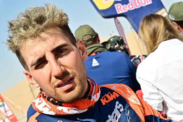 Argentinian rider Luciano Benavides reacts after competing with a Ktm 450 Rally Factory in Stage 9, a marathon stage, during the 48th edition of the Dakar Rally 2026 between Wadi ad-Dawasir and Bisha in Saudi Arabia on January 13, 2026. (Photo by Giuseppe CACACE / AFP)