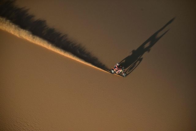 TOPSHOT - Argentinian rider Luciano Benavides competes with a Ktm 450 Rally Factory in Stage 9, a marathon stage, during the 48th edition of the Dakar Rally 2026 between Wadi ad-Dawasir and Bisha in Saudi Arabia on January 13, 2026. (Photo by Giuseppe CACACE / AFP)