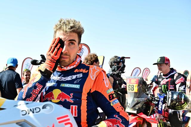 Argentinian rider Luciano Benavides reacts after competing with a Ktm 450 Rally Factory in Stage 9, a marathon stage, during the 48th edition of the Dakar Rally 2026 between Wadi ad-Dawasir and Bisha in Saudi Arabia on January 13, 2026. (Photo by Giuseppe CACACE / AFP)