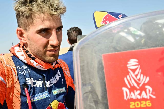 Argentinian rider Luciano Benavides reacts after competing with a Ktm 450 Rally Factory in Stage 9, a marathon stage, during the 48th edition of the Dakar Rally 2026 between Wadi ad-Dawasir and Bisha in Saudi Arabia on January 13, 2026. (Photo by Giuseppe CACACE / AFP)