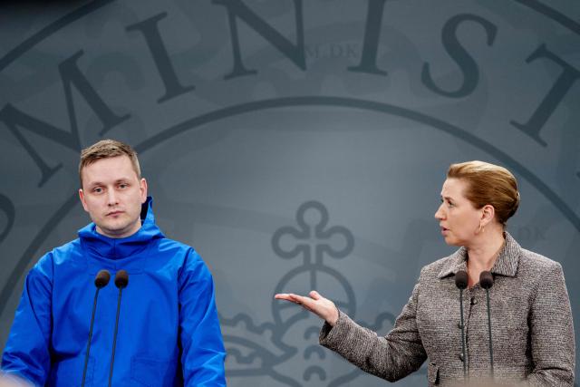 Greenland's Head of Government (Naalakkersuisut) Jens-Frederik Nielsen (L) and Denmark's Prime Minister Mette Frederiksen give a statement in the Mirror Hall at the Prime Minister's Office in Copenhagen, Denmark, on January 13, 2026. Nielsen said that the autonomous territory of Greenland would choose to remain Danish rather than become part of the United States, following US President Donald Trump's threats to take over the Arctic island. Frederiksen meanwhile said it had not been easy to stand up to what she slammed as "completely unacceptable pressure from our closest ally". (Photo by Liselotte Sabroe / Ritzau Scanpix / AFP) / Denmark OUT