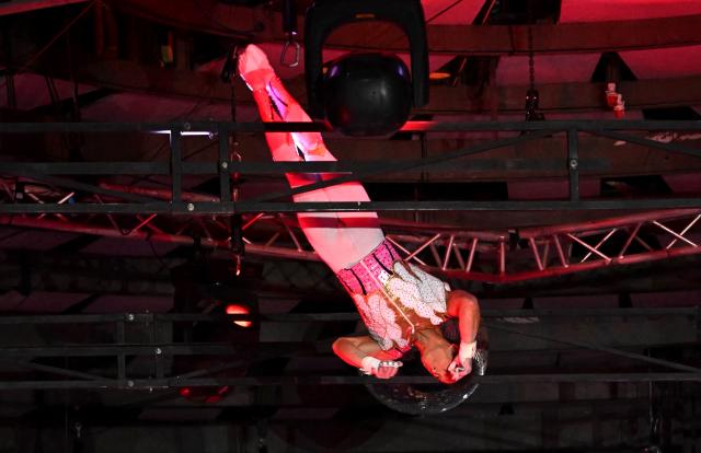 Argentine and American acrobats, members of the 'Flying Tabares' group, perform on air at the Capital Grand Circus during the awarding ceremony of the 16th Budapest International Circus Festival in Budapest, Hungary, on January 12, 2026. This  festival is the second-largest professional circus arts event globally, ranking just behind the International Circus Festival of Monte-Carlo. (Photo by Attila KISBENEDEK / AFP)
