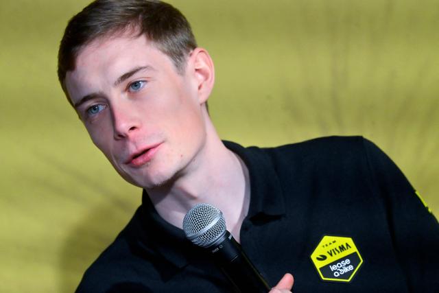 Visma-Lease a bike's Danish rider Jonas Vingegaard speaks at a press conference during the presentation of the Visma-Lease a Bike cycling team at La Nucia near Alicante, eastern Spain on January 13, 2026. (Photo by Jose Jordan / AFP)